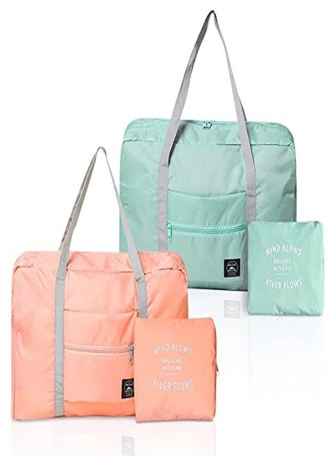 Flywind حقيبة سفر قابلة للطي من فلاي ويند، حقيبة أمتعة محمولة مقاومة للماء، حقيبة سفر خفيفة الوزن للرياضة، النادي الرياضي، العطلات، طقم من قطعتين (أزرق سماوي + وردي فاتح) - Image 1